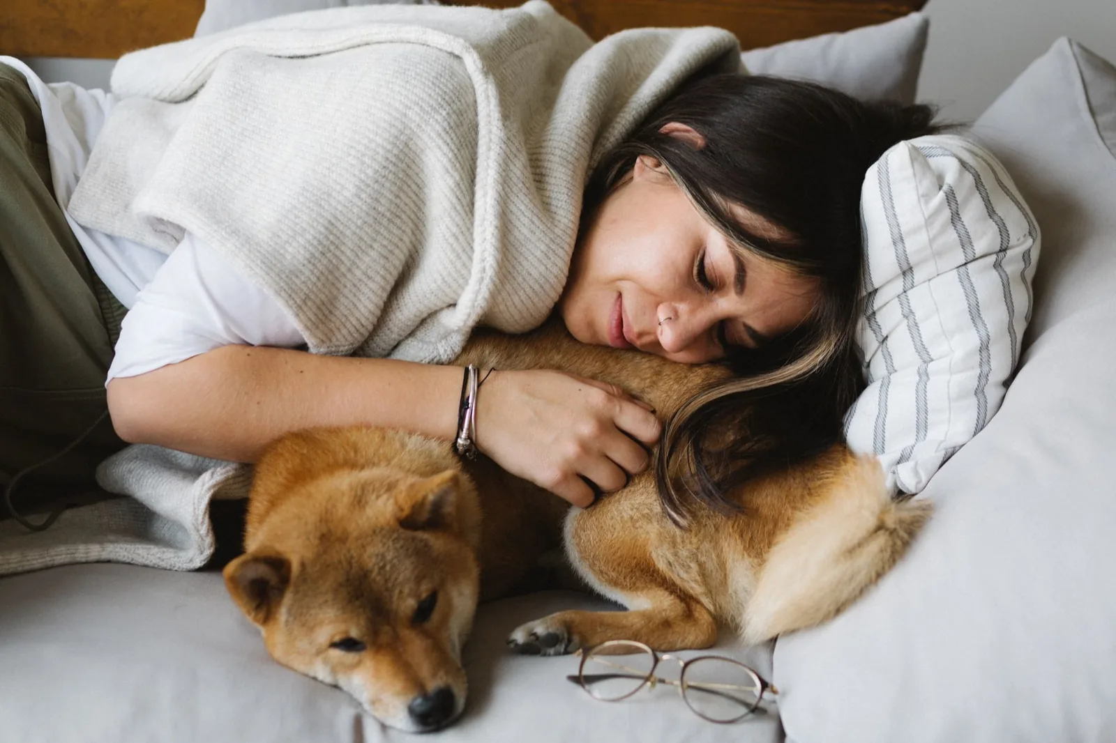 A pet owner embracing her happy dog at home in HSR Layout, Bengaluru